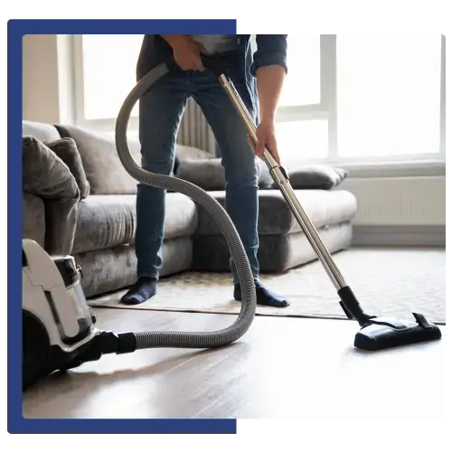 Professional cleaner vacuuming living room in a Bay Area home — Jales Cleaning Services